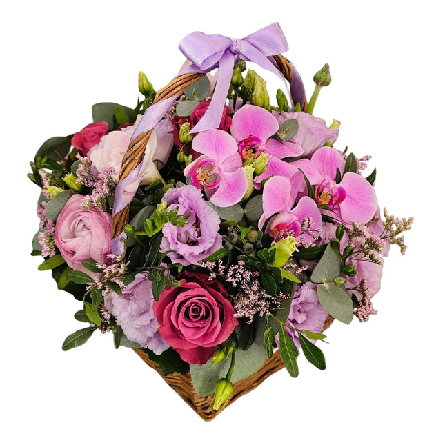 Blumenkorb mit Rosen rosa Orchideen und lila Lisianthus in Zürich bestellen