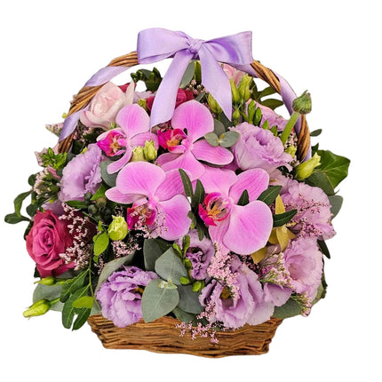 Blumenkorb mit Rosen rosa Orchideen und lila Lisianthus in Zürich bestellen