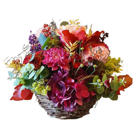 Herbstbrise Blumenkorb mit saisonalen Herbstblumen in lebendigen Herbstfarben