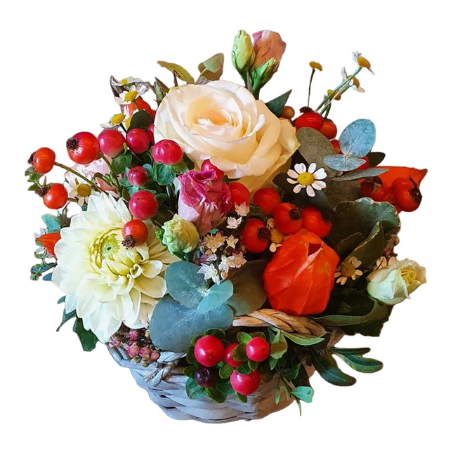 Herbstgedicht Blumenkorb mit saisonalen Herbstblumen und dekorativem Herbstlaub