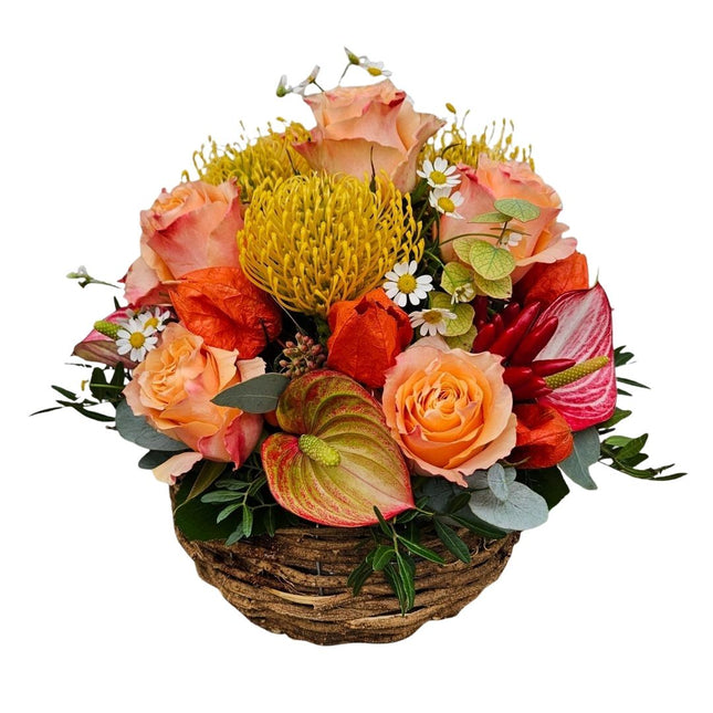 Bunter Blumenkorb mit orangefarbenen Herbstblumen