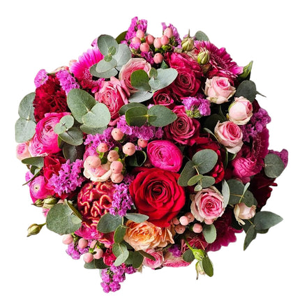 Üppiger Blumenkorb in Rosa und Rot mit Rosen und Gerbera