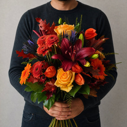 Herbststrauss mit Rosen Lilien Chrysanthemen und Physalis in Orange Rot Gelb und Bordeaux in Zürich verschicken
