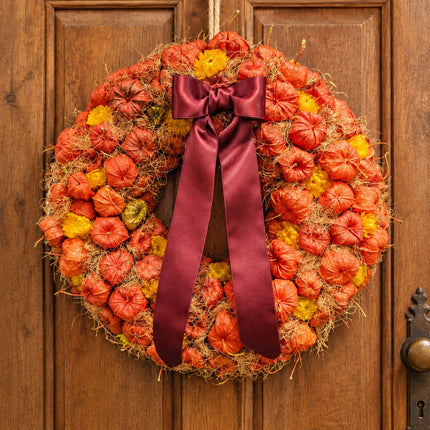 Herbstkranz mit Physalis in Orange und Rot mit Schleife online bestellen in Zürich